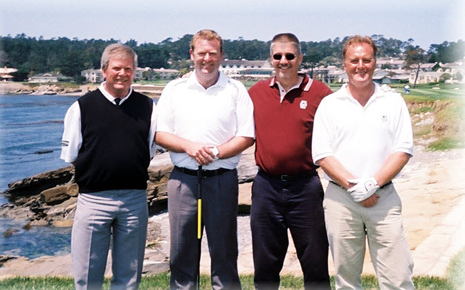 Golfing buddies (L-R) Joe Brook, Andy Smith, Scott Dow, and Ian Jennings on the 18th hole at Pebble Beach, England. (Courtesy of Scott Dow)