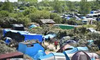 27 Police Hurt in 2 Nights of Unrest at Calais Migrant Camp