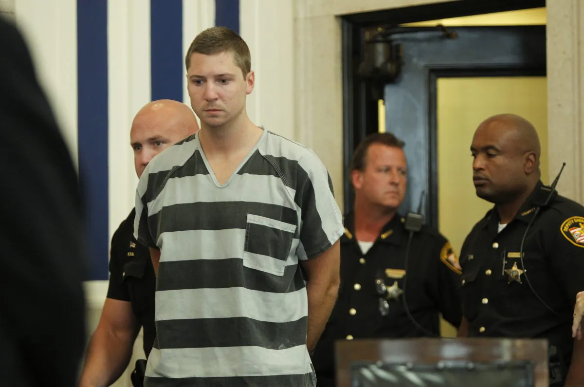 Former University of Cincinnati police officer Ray Tensing enters Hamilton County Common Pleas Court to be arraigned on murder charges July 30,  2014 in Cincinnati, Ohio. (Mark Lyons/Getty Images)