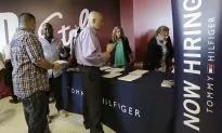 Applications for US Jobless Aid Rise to Still-Low 267,000