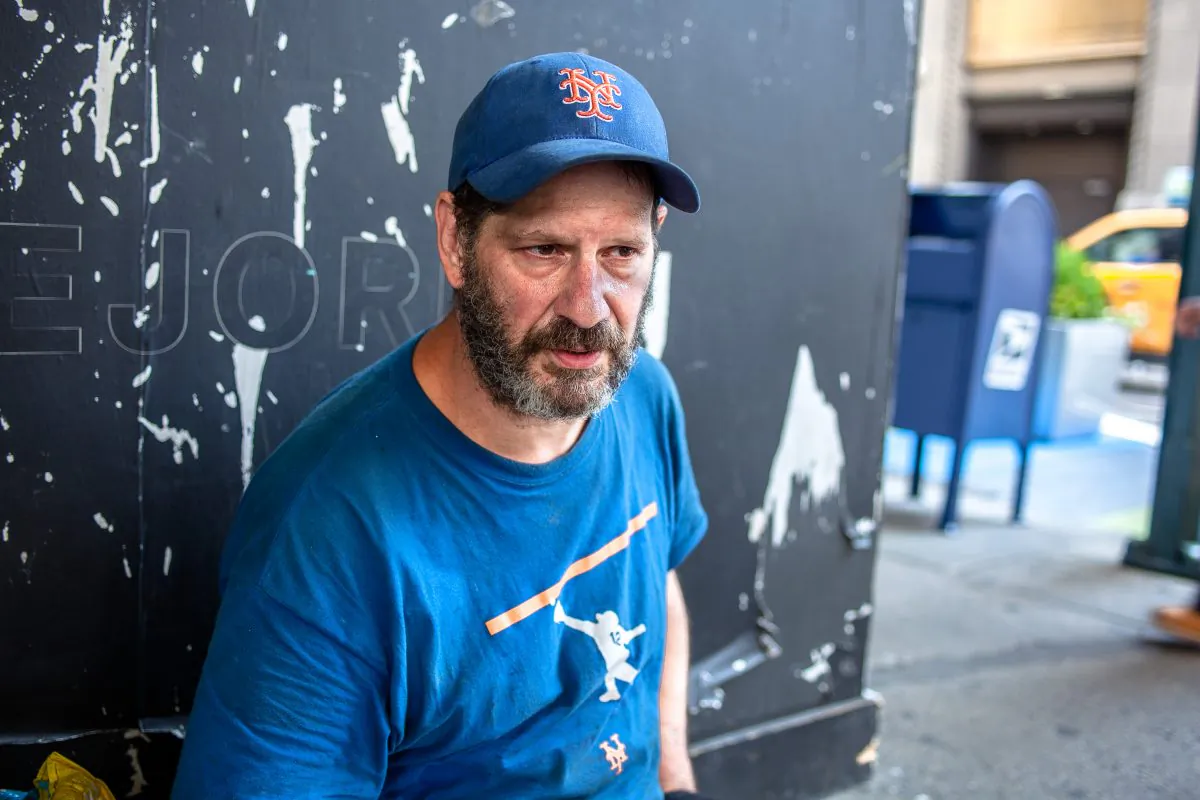 Darren Miller, 49, who has been homeless for six years, across the street from the Madison Square Garden in Chelsea, Manhattan, New York, on July 27, 2015. (Petr Svab/Epoch Times)