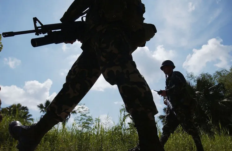 Philippine marines from the 3rd Battalion resume patrols around a former Moro Islamic Liberation Front. (David Greedy/Getty Images)