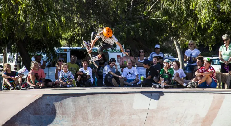 A skater completes a difficult flip trip. This is a 7 Stitch color graded image. (Daniel Craig/The Epoch Times)