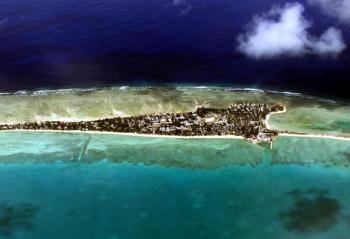 There is not much room to retreat from rising sea levels on Tarawa atoll, capital of the vast archipelago nation of Kiribati. (Torsten Blackwood/AFP/Getty Images)