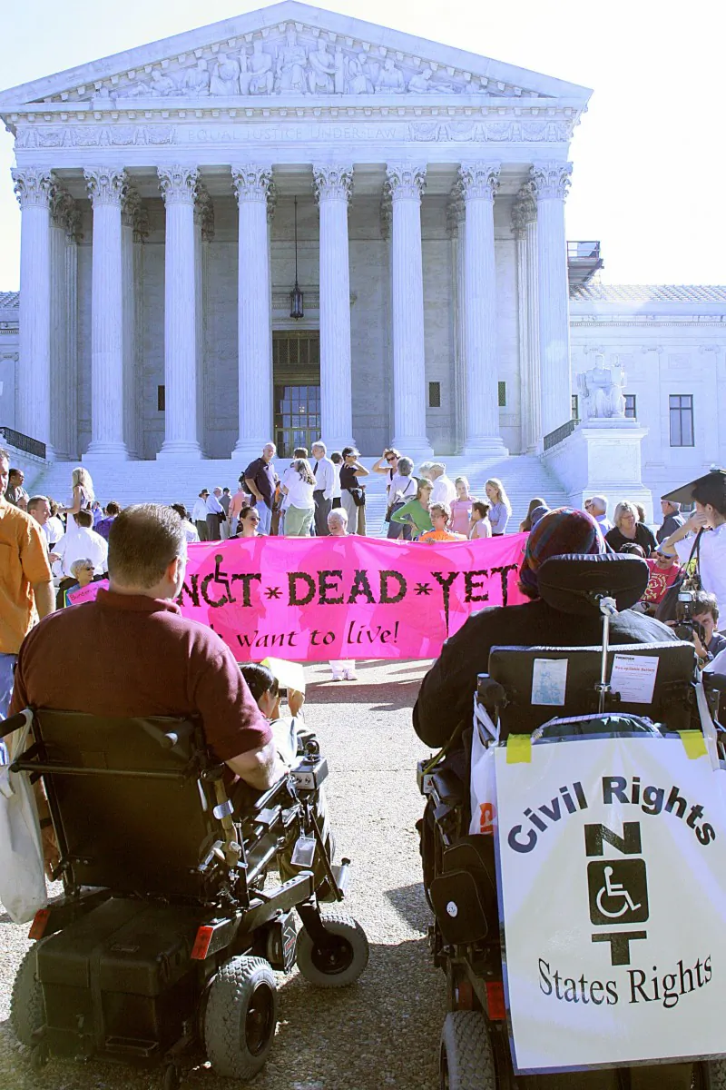Demonstrators representing the anti-assisted suicide organization Not Dead Yet protest in front of the U.S. Supreme Court in Washington, in 2005. Canada’s laws prohibiting assisted suicide are being challenged in court in a landmark case that began on Monday. (Karen Bleier/AFP/Getty Images)