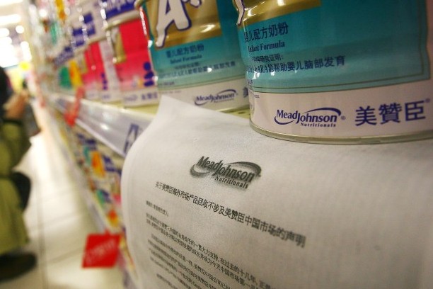 This 2006 file photo shows cans of Mead Johnson baby milk powder on a store shelf in Ningbo, Zhejiang Province, China. At the time, Mead Johnson recalled a batch of its powdered milk products after it were found to contain metal particles. (China Photos/Getty Images)