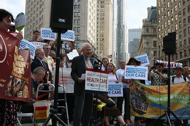 Mark Scherzer, legislative counsel for New Yorkers for Accessible Health Coverage, speaks at a rally at Foley Square applauding the Supreme Court ruling on the Affordable Care Act on Thursday in Manhattan. (Amelia Pang/The Epoch Times)