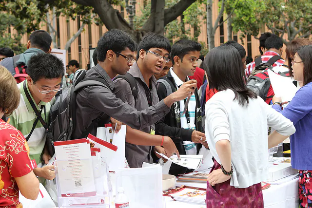 In this file photo from the start of the 2011 academic school year at the University of Southern California, new students gather at the International Graduate Student Resources Fair as part of their orientation to campus life. Indian and Chinese students contribute largely to the makeup of international students studying in the United States. (Dennis Martinez/University of Southern California)