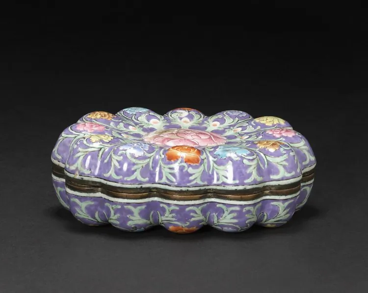 This enamel floriform-covered box from the Qianlong period sold for $206,500, ten times its estimate. (Courtesy of Bonhams)