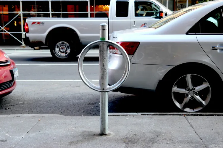 Single-space meters are refitted to be bicycle racks; 12,000 more of these are coming to the city, according to an awarded bid. (Courtesy of DOT)
