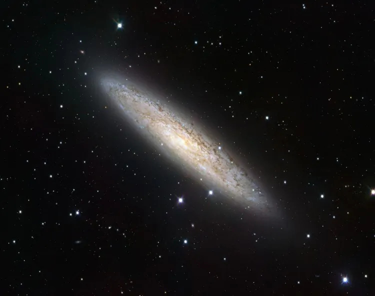 In this image captured by the VST, the Sculptor Galaxy is seen to be forming stars actively. (European Southern Observatory)