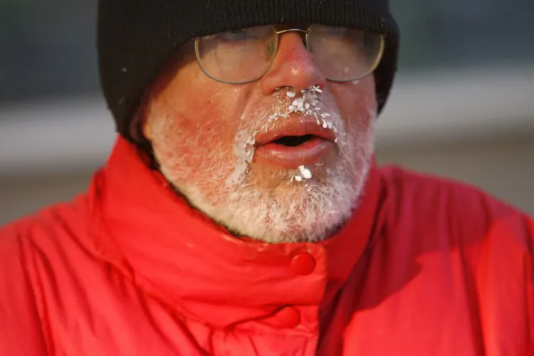 In this archive photo, ice forms on the face of a homeless man who did not want to be named in Milwaukee, Wisconsin. The long-term recession has left some homeless, and many families trying to cope with less, and cherish what they have. (Darren Hauck/Getty Images)