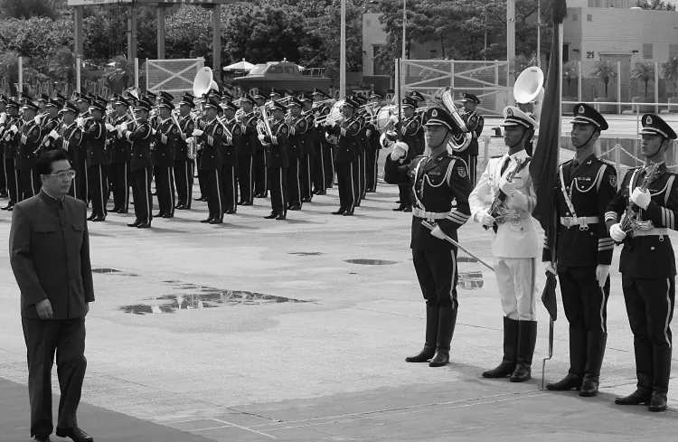 Hu Jintao inspects the People's Liberation Army Garrison during a visit to the Stonecutters Naval Base in Hong Kong June 2007. Hu recently made a series of personnel changes that increase his power over the Chinese military. (Mike Clarke/AFP/Getty Images)