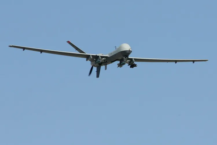 An aerial drone flies by on a training mission at Creech Air Force Base in Indian Springs, Nev., in this file photo. Drones are now being used for nature conservation all over the world. (Ethan Miller/Getty Images)