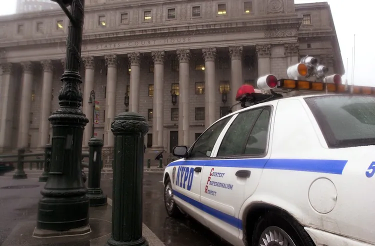 A New York Police vehicle sits by the federal courthouse February 5, 2001 in New York City. (Spencer Platt/Newsmakers)