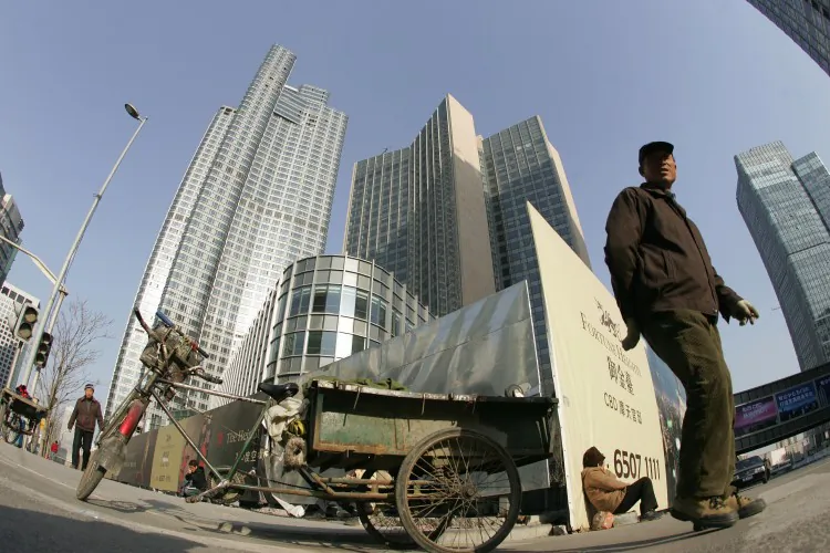 New office and residential buildings in Beijing, December 2007. Experts are skeptical about a new plan to stimulate the Chinese economy through massive spending. (Peter Parks/AFP/Getty Images)