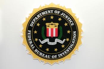 The US Federal Bureau of Investigation, or FBI, under the Department of Justice, logo. (Saul Loeb/Getty Images)