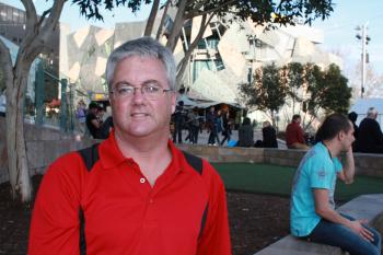 Tim McGrath loves sports and has seen sports events all around the world. (David Bryceson/The Epoch Times) Tim McGrath loves sports and has seen sports events all around the world. (David Bryceson/The Epoch Times)