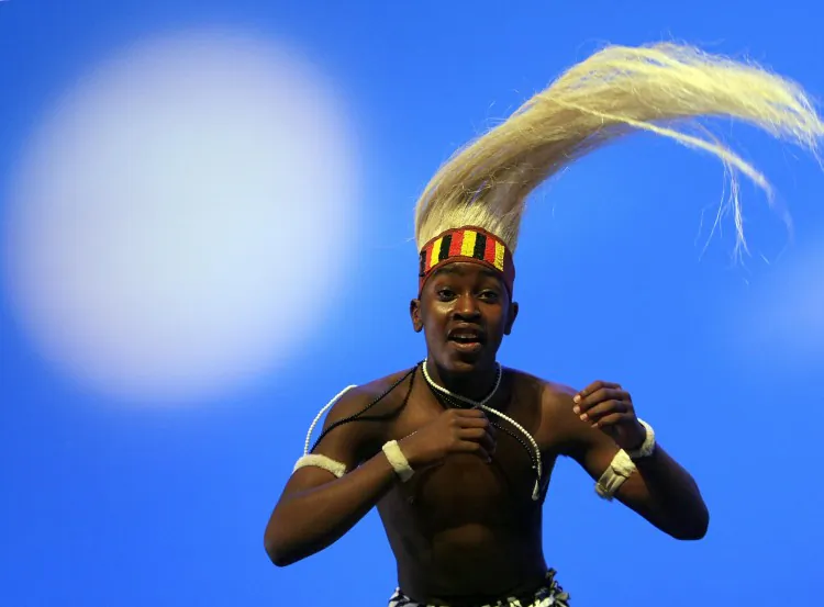 A dancer of an african dance group performs during a dress rehearsal on March 18, 2008. (TIMOTHY A. CLARY/AFP/Getty Images)