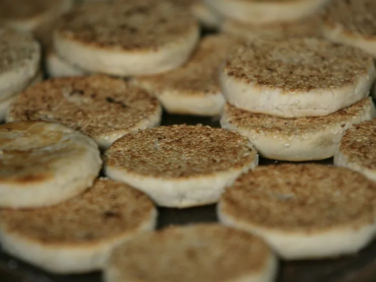 Cakes prepared for the Mid-autumn Festival are seen at a handmade crispy cake factory in August 2008. Tainted moon cakes and other school foods are blamed for one student’s death in China and hundreds sent to hospital. (China Photos/Getty Images)