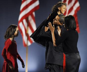 Democratic presidential candidate Barack Obama and family stand on stage during his election night victory rally at Grant Park on in Chicago, Illinois. Americans emphatically elected Obama as their first black president in a transformational election whic (TIMOTHY A. CLARY/AFP/Getty Images) Democratic presidential candidate Barack Obama and family stand on stage during his election night victory rally at Grant Park on in Chicago, Illinois. Americans emphatically elected Obama as their first black president in a transformational election whic (TIMOTHY A. CLARY/AFP/Getty Images)