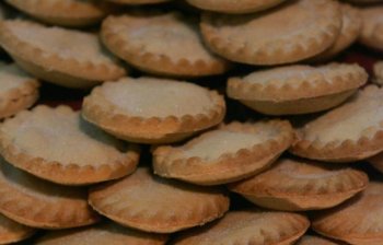 Mince pies are stacked up at the annual mince pie eating contest, in Wookey Hole, near Wells, England. (Matt Cardy/Getty Images)