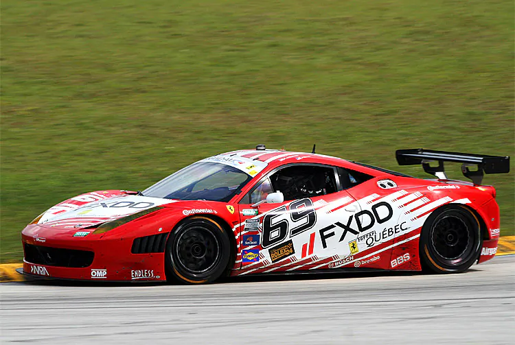 AIM Autosport drove the No. 69 Ferrari 458 to three wins and eight podiums in 2012, earning the GT championship. The team will race two cars in 2013. (Chris Jasurek/The Epoch Times)