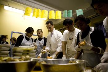 New Yorkers, including Rep. Anthony Weiner, take their time to prepare food for the homeless on Martin Luther King Jr. Day. (Ramin Talaie/Getty Images)