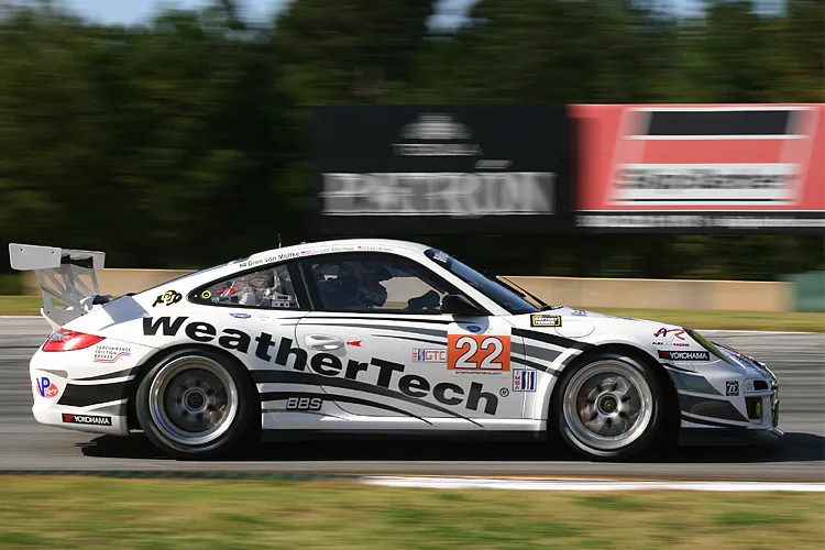 AJR’s Porsche practices for the ALMS Petit Le Mans, Oct. 19, 2012. 2012 ALMS GTC champion Cooper MacNeil heads an all-star driver roster for AJR’s 2013 Rolex 24 entry. (James Fish/The Epoch Times)
