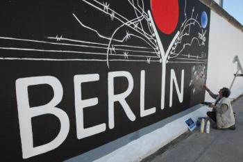 Murals decorate a surviving portion of the Berlin Wall. Germany will mark 20 years since the fall of the Wall with an international commemoration in November. (Sean Gallup/Getty Images)