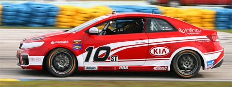 8720Kia10Miami2012WEB Teammate Andy Lally was right behind in the #10 Kinetic/Kia car. (Chris Jasurek/The Epoch Times)