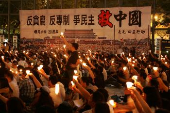 Thousands of protestors hold candles during a candlelight vigil for the 20th anniversary of June 4 Tiananmen Square Massacre in Beijing at Victoria Park on June 4, 2009 in Hong Kong. (MN Chan/Getty Image) Thousands of protestors hold candles during a candlelight vigil for the 20th anniversary of June 4 Tiananmen Square Massacre in Beijing at Victoria Park on June 4, 2009 in Hong Kong. (MN Chan/Getty Image)
