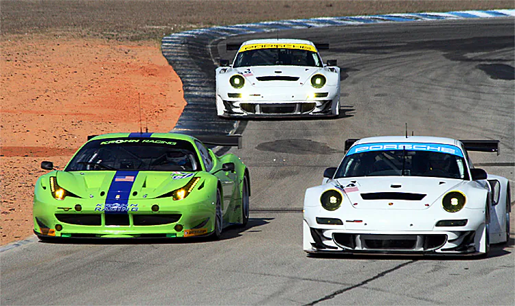 The Krohn Ferrari spars with the two Flying Lizard Porsches during the ALMS Winter Test Wednesday afternoon session. (James Fish/The Epoch Times)
