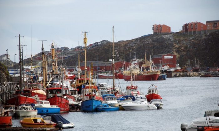 The port of Nuuk, capital of Greenland, July 6, 2009. Manufacturing could bring an influx of foreign workers to the Arctic island, heralding great change for the sparsely populated land. (Slim ALLAGUI/AFP/GettyImages)