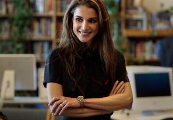 INSPIRATION: Queen Rania of Jordan smiles in a classroom at the Young Women's Leadership School in East Harlem. (Chris Hondros/Getty Images)