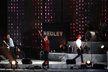 Tommy Mac, Jacob Hoggard, Dave Rosin and Chris Crippin of Hedley perform during the Closing Ceremony. (Richard Heathcote/Getty Images) Tommy Mac, Jacob Hoggard, Dave Rosin and Chris Crippin of Hedley perform during the Closing Ceremony. (Richard Heathcote/Getty Images)
