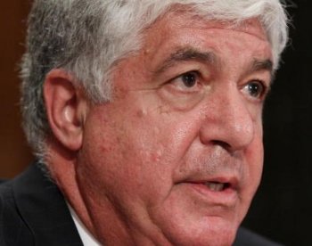 AIG's CEO Robert Benmosche, at US Congress on May 26. AIG outlined a plan on Thursday, Sept. 30 to formally repay the debt it owes the US government. (Mark Wilson/Getty Images)