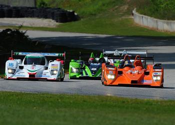 The #16 Dyson Lola-Mazda chases the Autocon Lola-AER (R) past the Patr&#243n Highcroft HPD (C) and the Cytosport Porsche (Rear) just after the start of the ALMS Road America race. (Americanlemans.com)