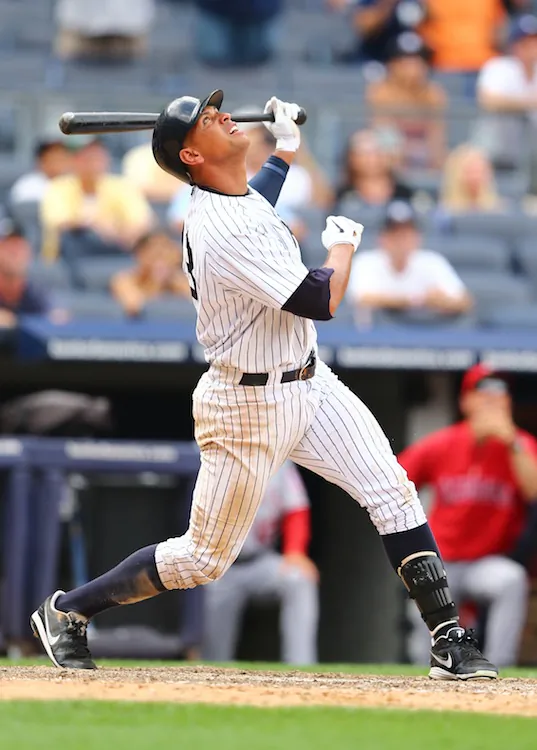 Alex Rodriguez, who homered in the first inning, popped out with the bases loaded to end the game. (Al Bello/Getty Images)