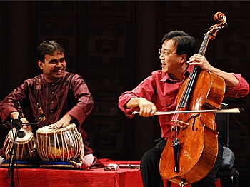 Yo Yo Ma (on R) in a performance of the Silk Road Ensemble. (Courtesy of Silk Road Ensemble)
