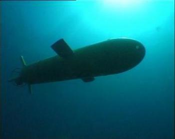 An Explorer-class autonomous underwater vehicle (AUV) operating underwater. The vessels are designed to operate autonomously underneath the Arctic ice shelf at depths of up to 5,000 metres. (Courtesy of ISE)