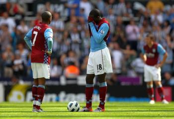 Aston Villa players stand dejected during their match against Newcastle last Sunday. (Alex Livesey/Getty Images )