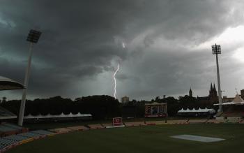 DOOM AND GLOOM: Too late for Australia �¢ï¿½�¦ Lightning breaks behind Adelaide Oval as rain and thunderstorms hit the ground after the end of Day 5 of the Second Ashes Test match between Australia and England. (Hamish Blair/Getty Images) DOOM AND GLOOM: Too late for Australia �¢ï¿½�¦ Lightning breaks behind Adelaide Oval as rain and thunderstorms hit the ground after the end of Day 5 of the Second Ashes Test match between Australia and England. (Hamish Blair/Getty Images)