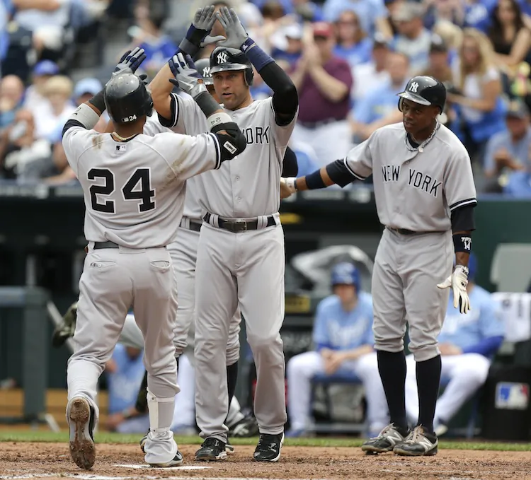 Yankee players (L-R) Robinson Cano, Derek Jeter, and Curtis Granderson were all voted into this year's All-Star Game in Kansas City. (Ed Zurga/Getty Images)