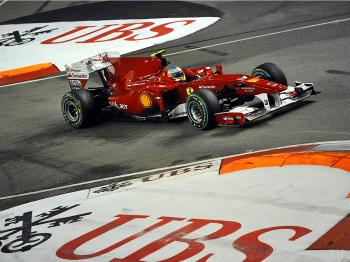 Fernando Alonso captured the pole for the Formula 1 Singapore Grand Prix, edging Red Bull's Sebastian Vettel to give his world championship hopes a boost. (Saeed Khan/AFP/Getty Images) Fernando Alonso captured the pole for the Formula 1 Singapore Grand Prix, edging Red Bull's Sebastian Vettel to give his world championship hopes a boost. (Saeed Khan/AFP/Getty Images)