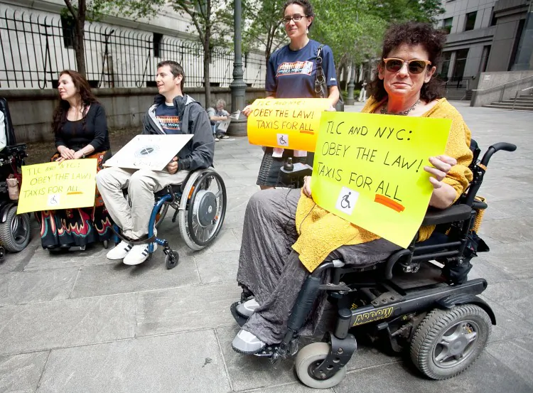 Advocates for wheelchair accessible taxis gathered on May 24, 2011, at the U.S. District Court in Lower Manhattan. (Amal Chen/The Epoch Times)