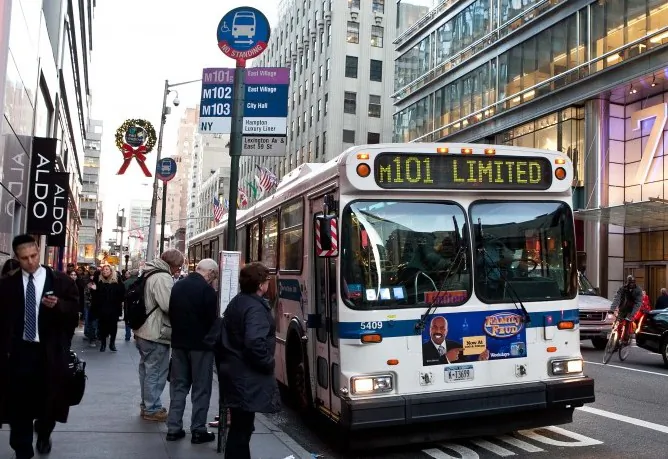 The M50 bus, with name given of Pokey by the NYPIRG Straphangers, at the cross section of 7th Avenue and 50th Street in Manhattan on Thrusday. (Benjamin Chasteen/The Epoch Times)