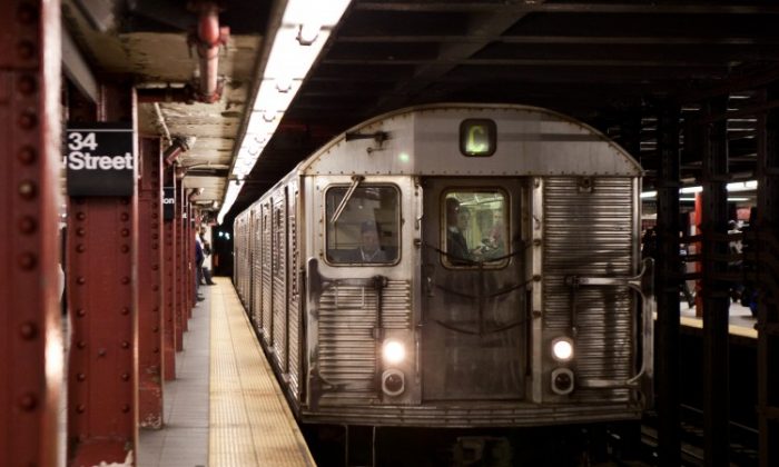 A C line train pulls into Penn Station; A, C, E train schedules are affected by overnight subway work this week. (Amal Chen/The Epoch Times)