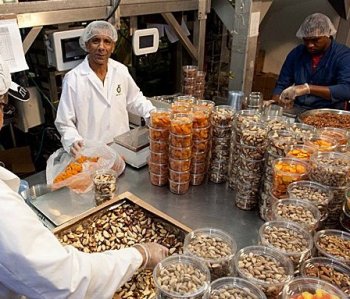 Employees at Terrafina LLC package nuts for wholesale in Brooklyn on Tuesday. (AMAL CHEN/The Epoch Times) Employees at Terrafina LLC package nuts for wholesale in Brooklyn on Tuesday. (AMAL CHEN/The Epoch Times)