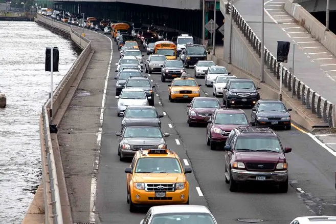 Cars making the afternoon commute in New York City. (Mario Tama/Getty Images)